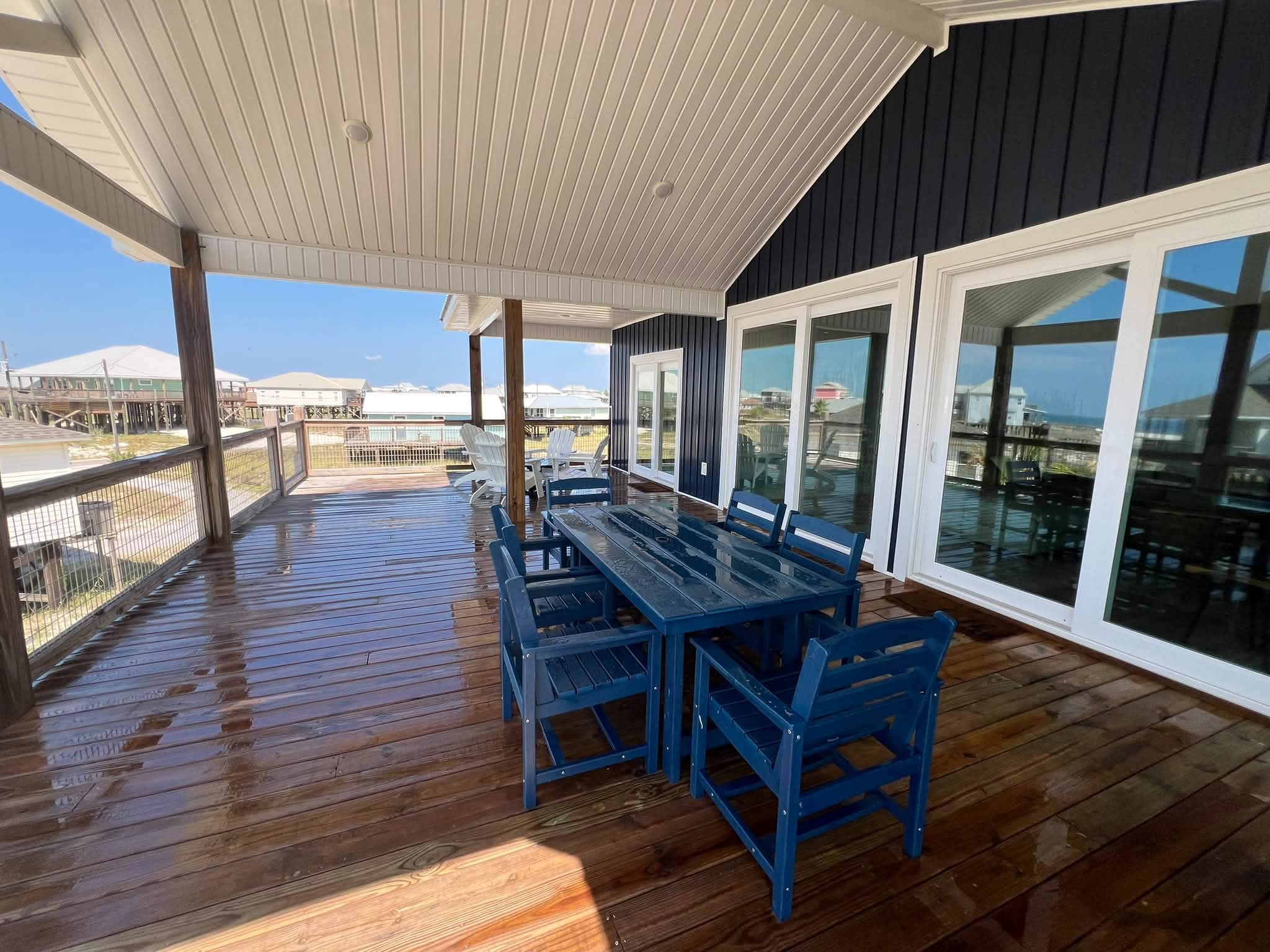 Freshly pressure washed beach house deck on Dauphin Island